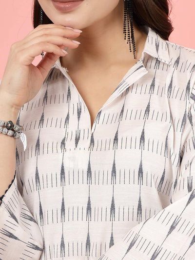 Ikat printed shirt collar kurti with three-quarter sleeves and high-low hemline.