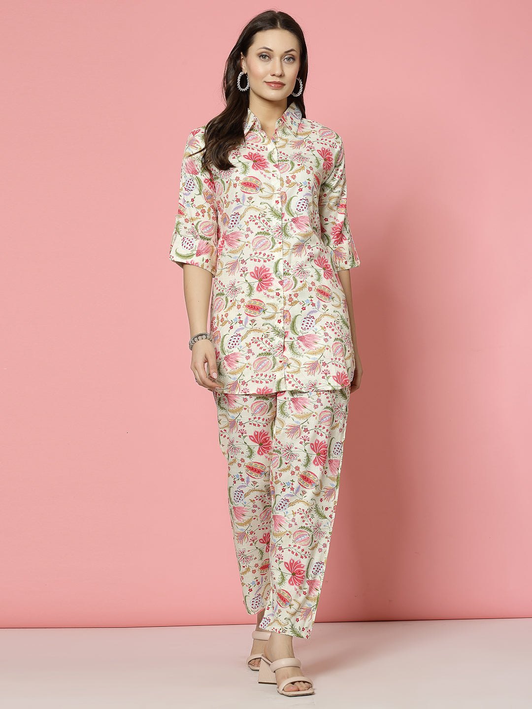 Floral printed shirt with trousers co-ords in pink and green, featuring three-quarter sleeves and elasticated waistband.