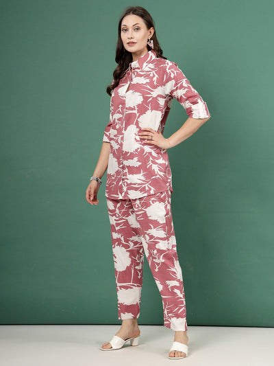 Printed shirt and trousers co-ords with abstract pattern, three-quarter sleeves, and elasticated waistband.