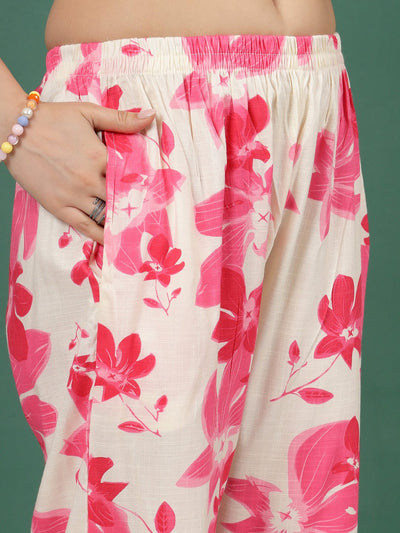 Pink floral printed shirt with trousers co-ords, featuring three-quarter sleeves and elastic waistband.