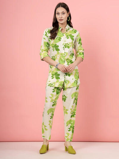 Floral printed shirt with trousers co-ords, featuring a pink and green floral design, three-quarter sleeves, and elasticated waistband.
