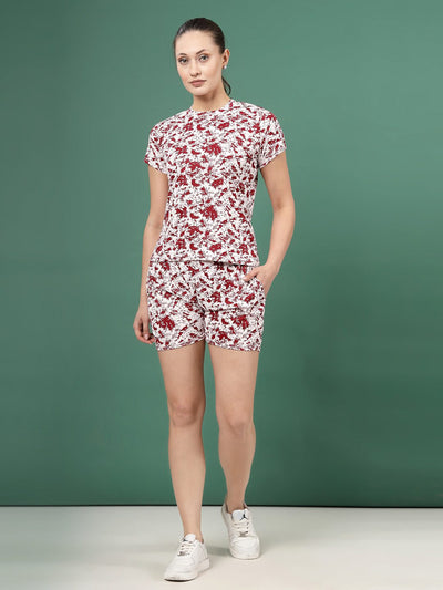 Maroon abstract printed top with shorts co-ords featuring round neck and cap sleeves.