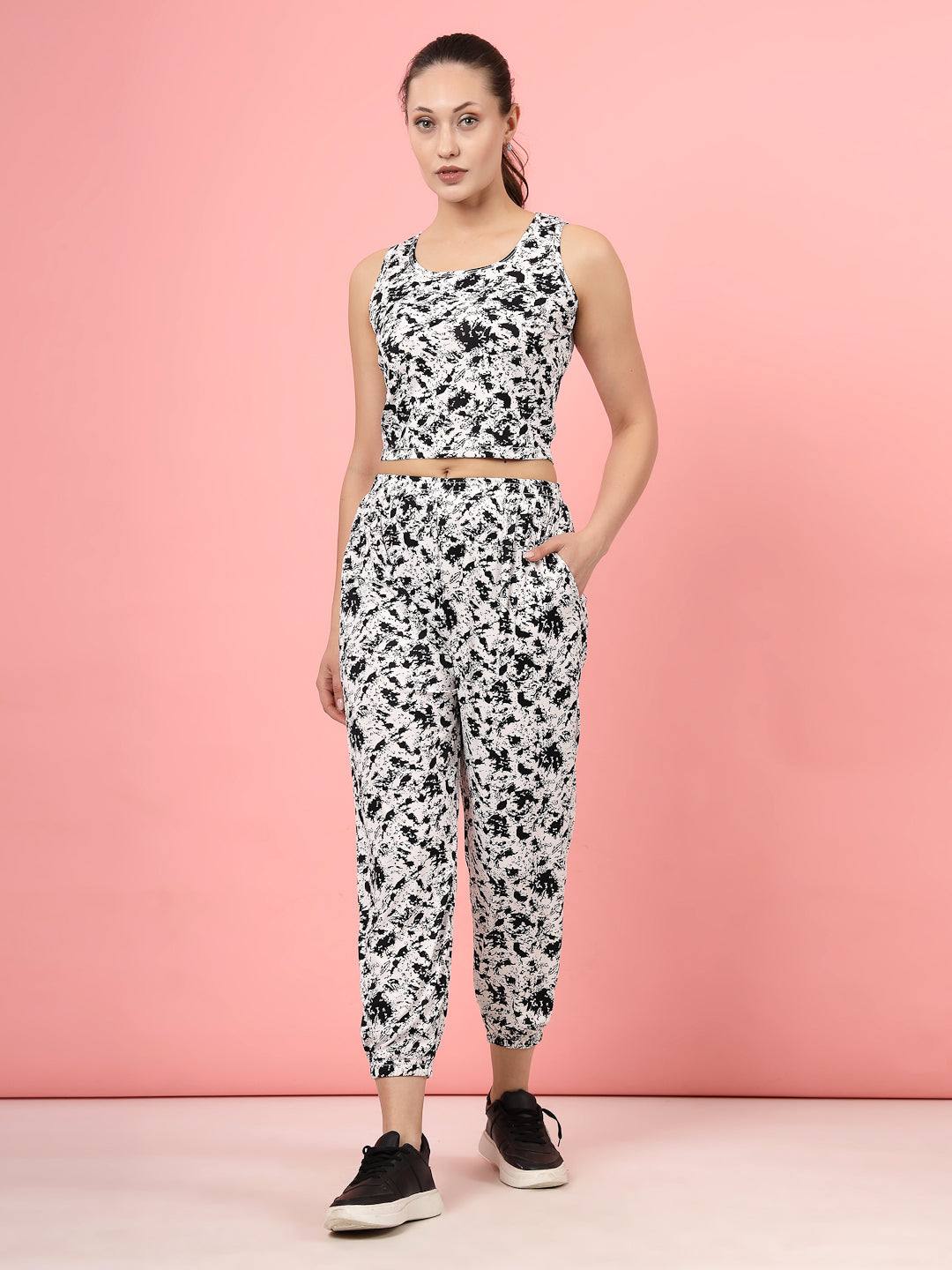 Printed sleeveless top with joggers co-ords featuring a black abstract design.