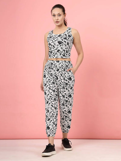 Printed sleeveless top with joggers co-ords featuring a black abstract design.
