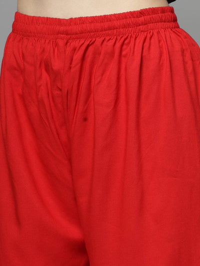 Yoke design kurta with Afghani pants in vibrant red, featuring mandarin collar and three-quarter sleeves.