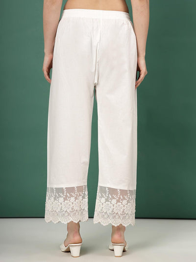 Off-White Palazzo Pants with Organza Lace Border, wide-legged silhouette.