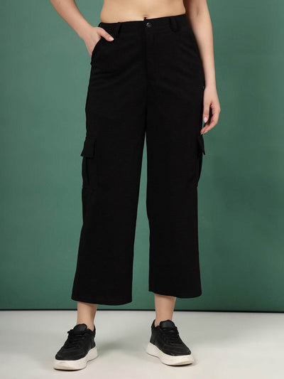 Black solid flat front mid-rise cargo trousers in corduroy material.