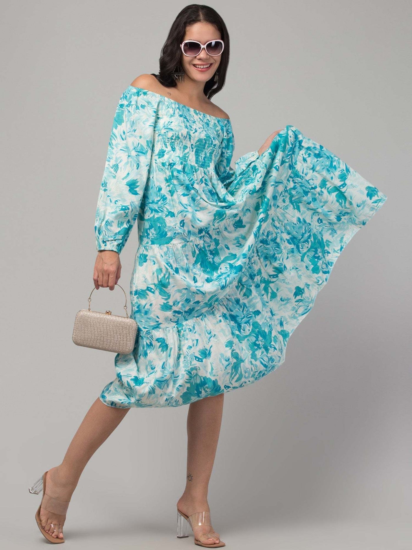 Women sea green printed fit & flare dress in viscose rayon fabric.