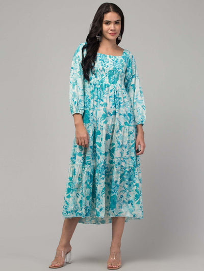 Women sea green printed fit & flare dress crafted from viscose rayon.