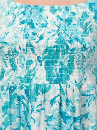 Women Sea Green Printed Fit & Flare Dress with floral pattern and smocked detailing.