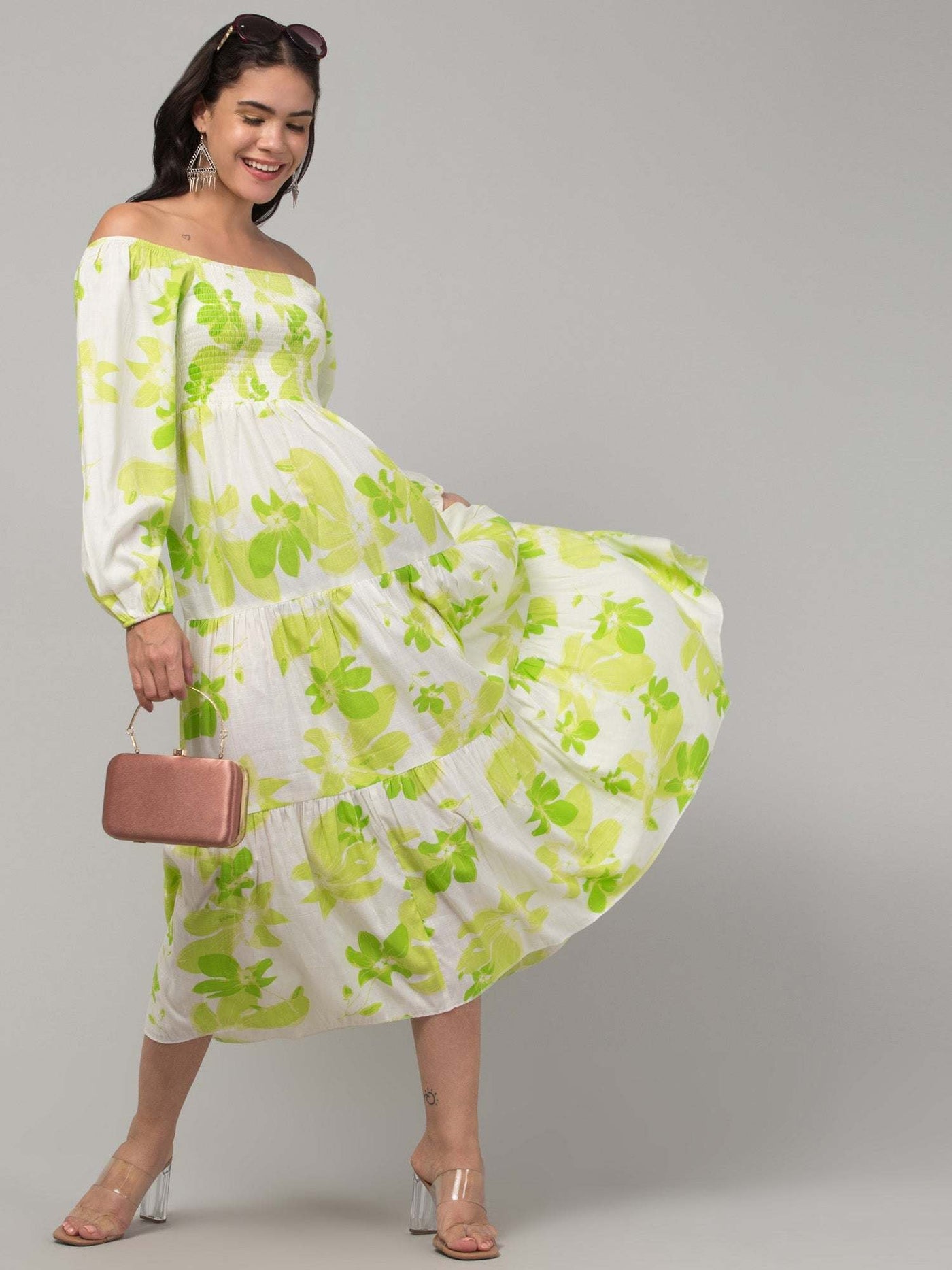 Women parrot green printed fit & flare dress in viscose rayon fabric.