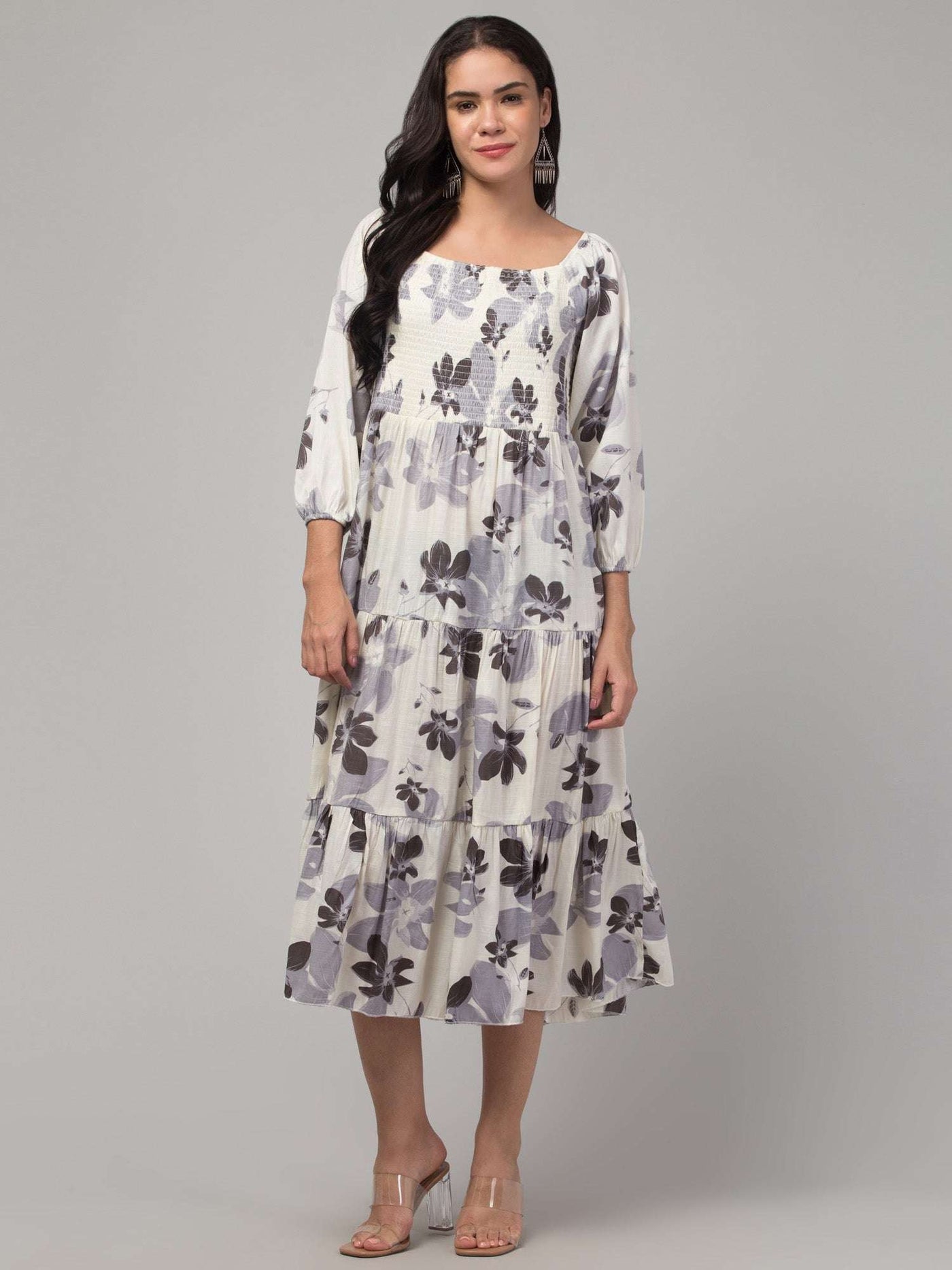 Women Black Printed Fit & Flare Dress in Viscose Rayon fabric, ideal for casual and semi-formal occasions.