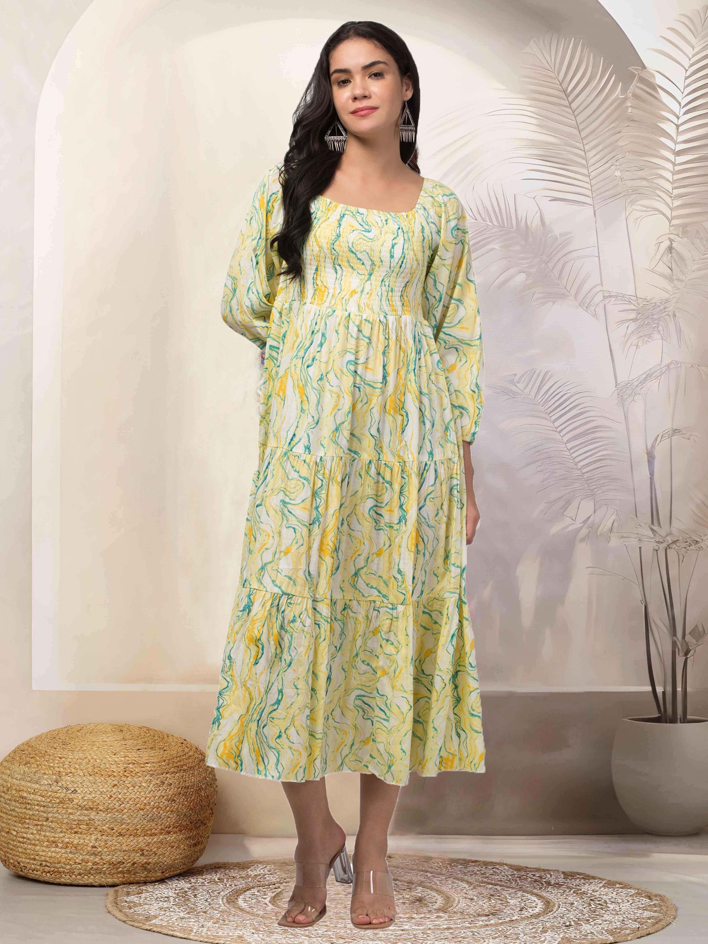 Women yellow printed fit & flare dress made from Viscose Rayon fabric, blending tradition and modernity.