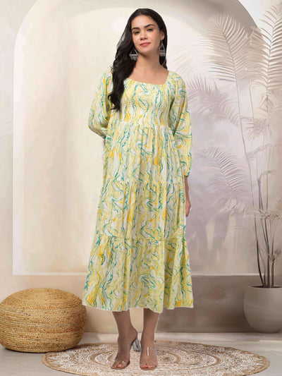 Women yellow printed fit & flare dress made from Viscose Rayon fabric, blending tradition and modernity.