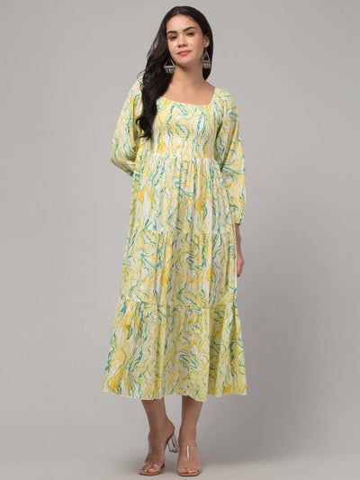 Women yellow printed fit & flare dress in viscose rayon, perfect for casual and semi-formal occasions.
