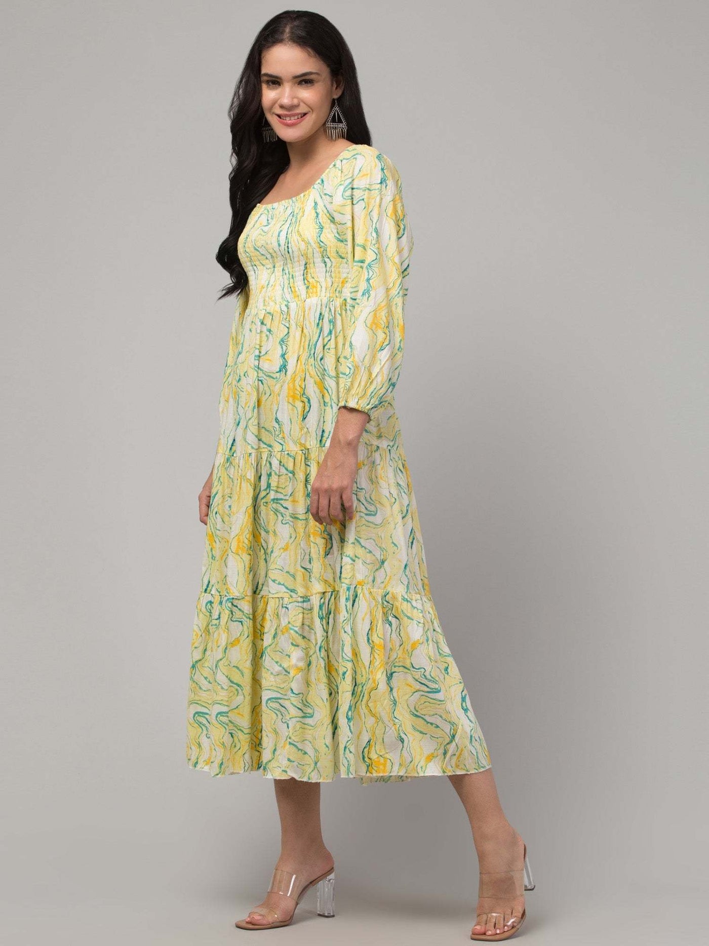 Women yellow printed fit & flare dress in viscose rayon fabric.