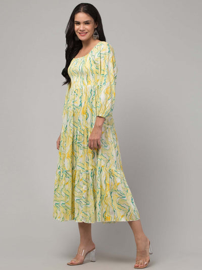 Women yellow printed fit & flare dress in viscose rayon fabric.