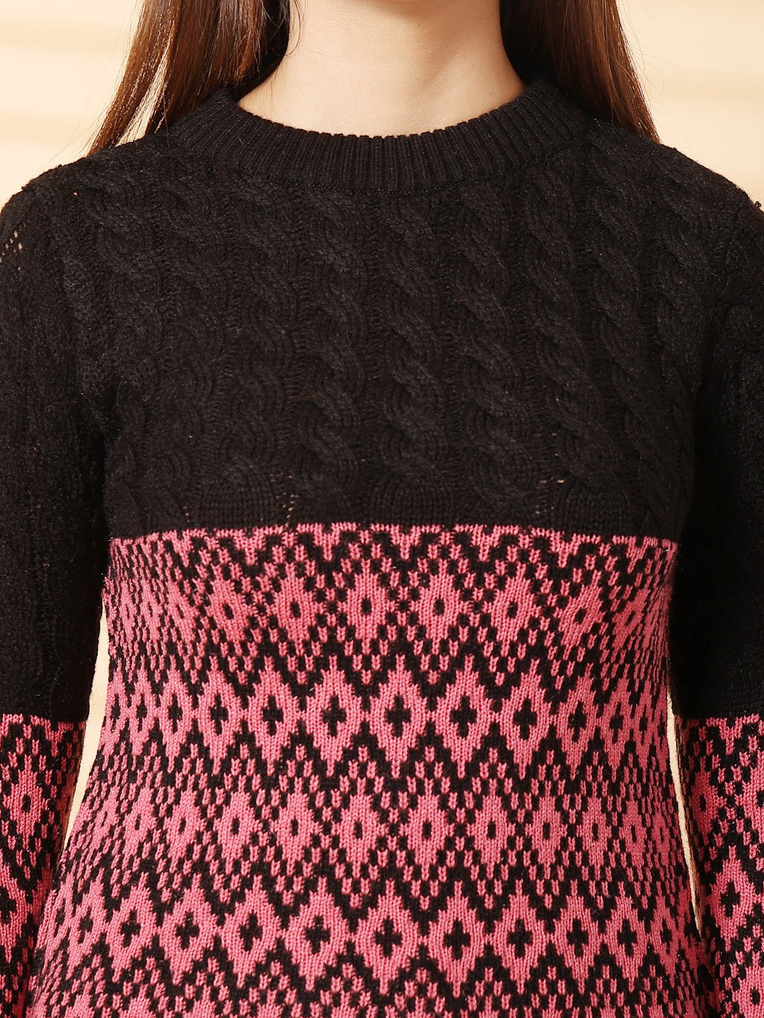 Black self design woolen top with full sleeves.