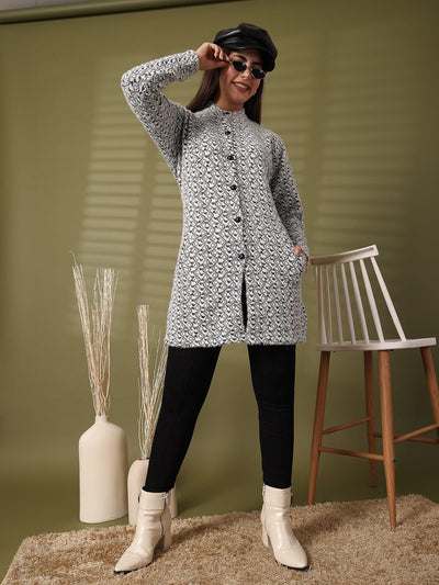 Black woolen knitted cardigan with full sleeves and open-front design, modeled with a chic outfit.