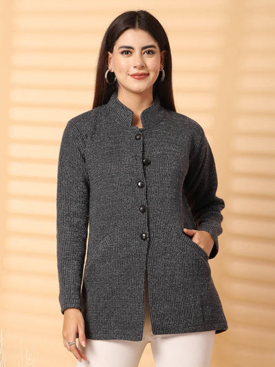 Black woolen knitted cardigan with full sleeves and buttoned front, worn by a model.