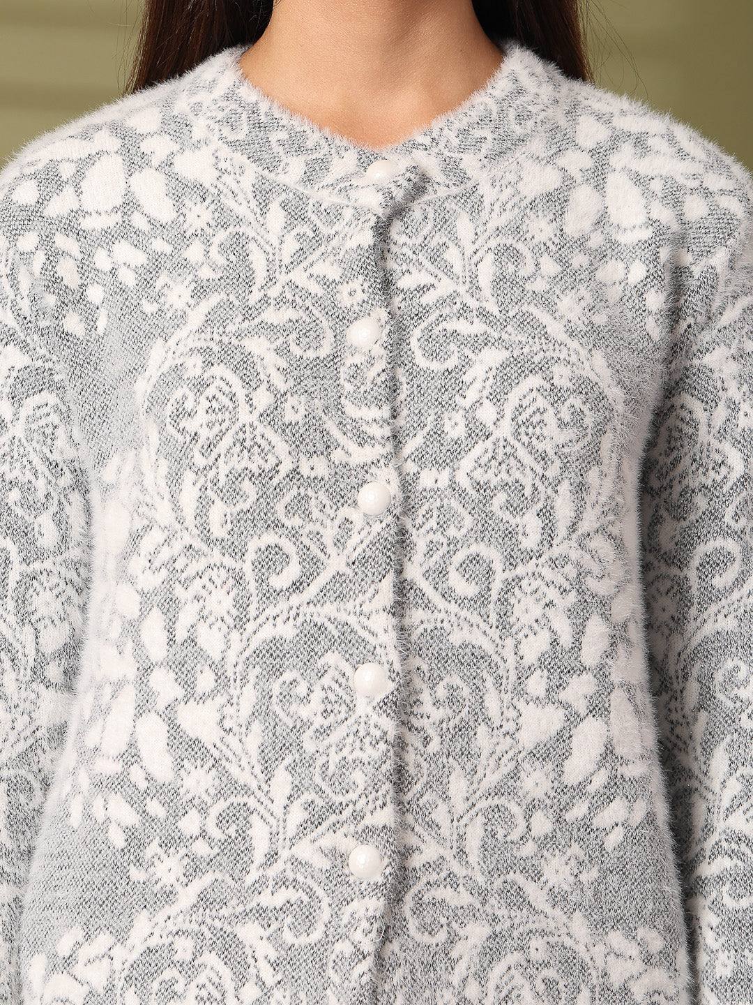 Grey woolen knitted cardigan with button details and floral pattern.