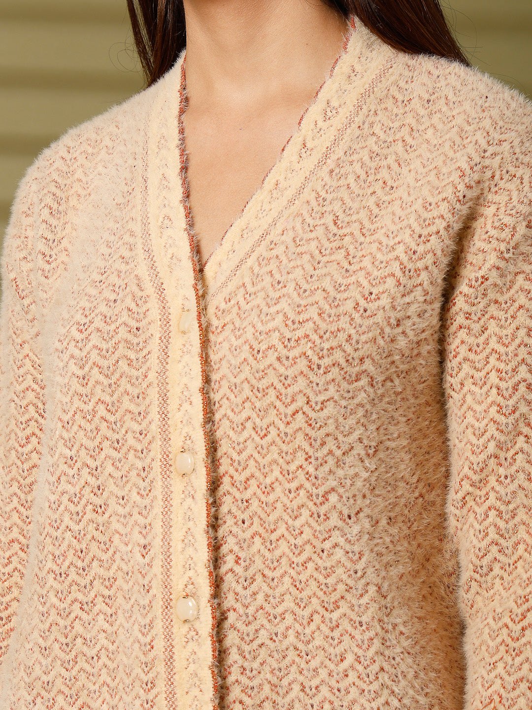 Fawn woolen knitted cardigan with full sleeves and open-front design.