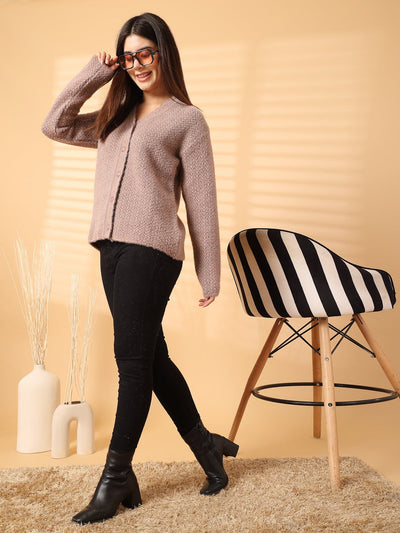 Light brown woolen knitted cardigan with full sleeves on a smiling woman.