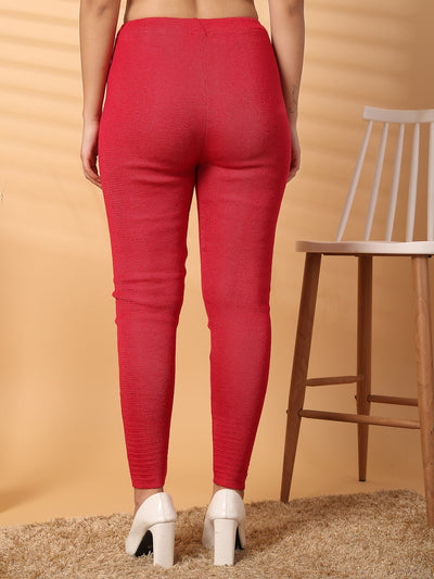 Women magenta solid woolen leggings with unique hem design for warmth and style.
