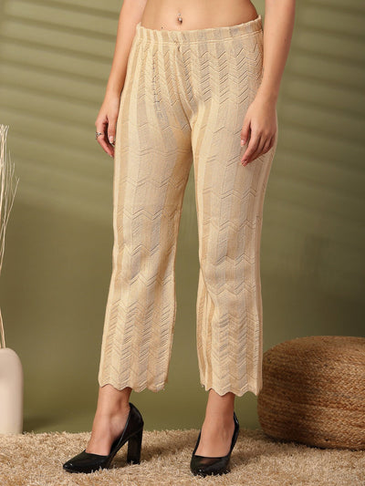 Beige woolen palazzo with cut work detailing by Clora Creation.