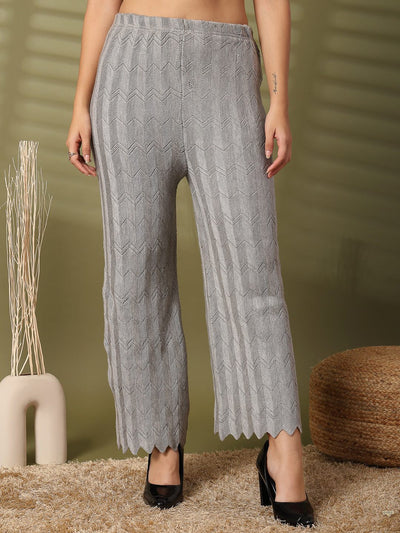 Grey solid cut work woolen palazzo with intricate hem detailing.