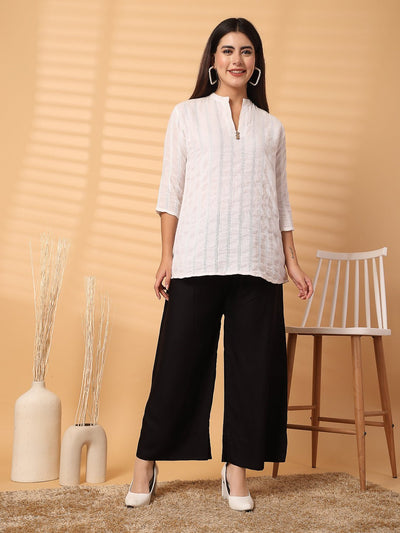 Black solid rayon straight palazzo with wide leg fit and elasticated waistband.