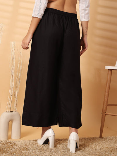 Black solid rayon straight palazzo with wide leg fit and elasticated waistband.