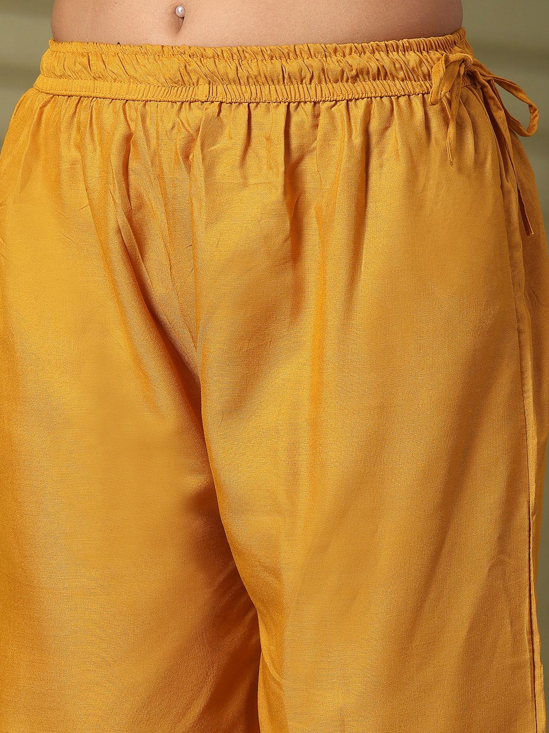 Mustard solid rayon straight palazzo with elastic waistband and wide leg fit.