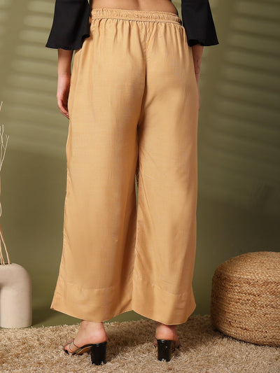 Fawn solid rayon straight palazzo with elasticated waistband and wide leg fit.