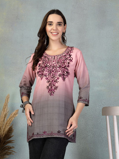 Pink embroidered rayon kurti, perfect for casual or festive wear.