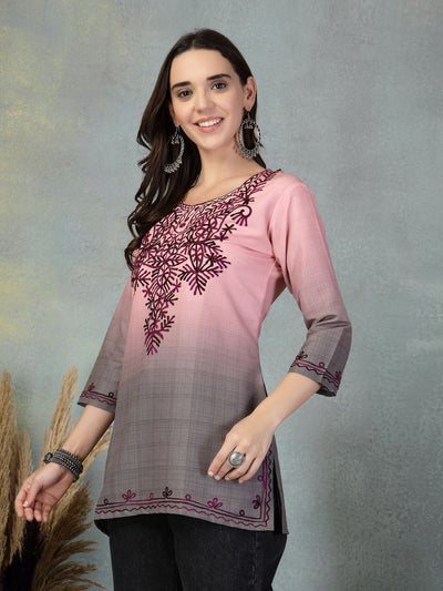 Pink embroidered rayon kurti with intricate floral design, perfect for casual and festive wear.
