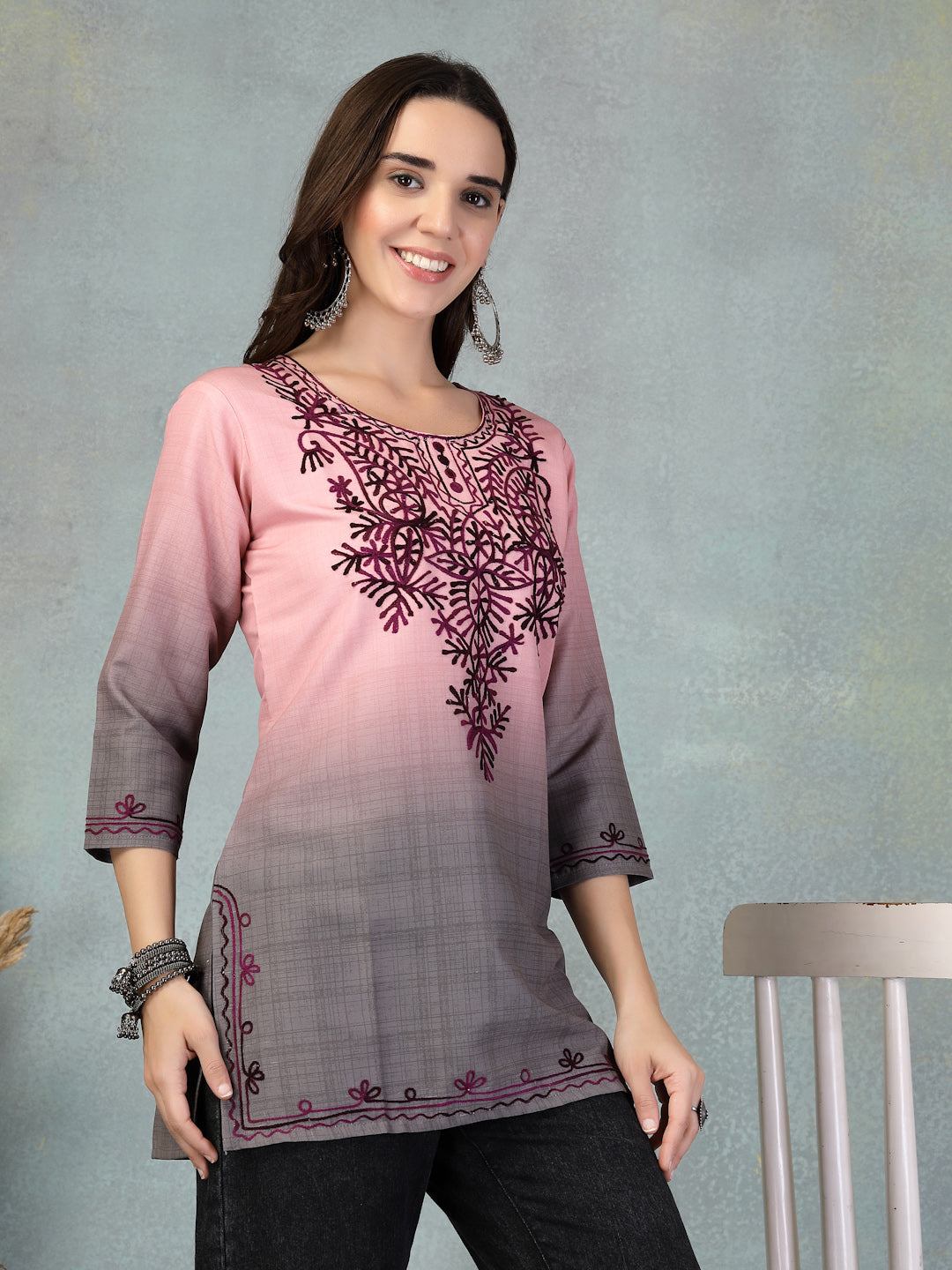 Pink embroidered rayon kurti with intricate design, suitable for casual, office, or festive wear.