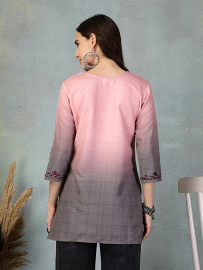 Pink embroidered rayon kurti with intricate detailing, suitable for casual or festive wear.