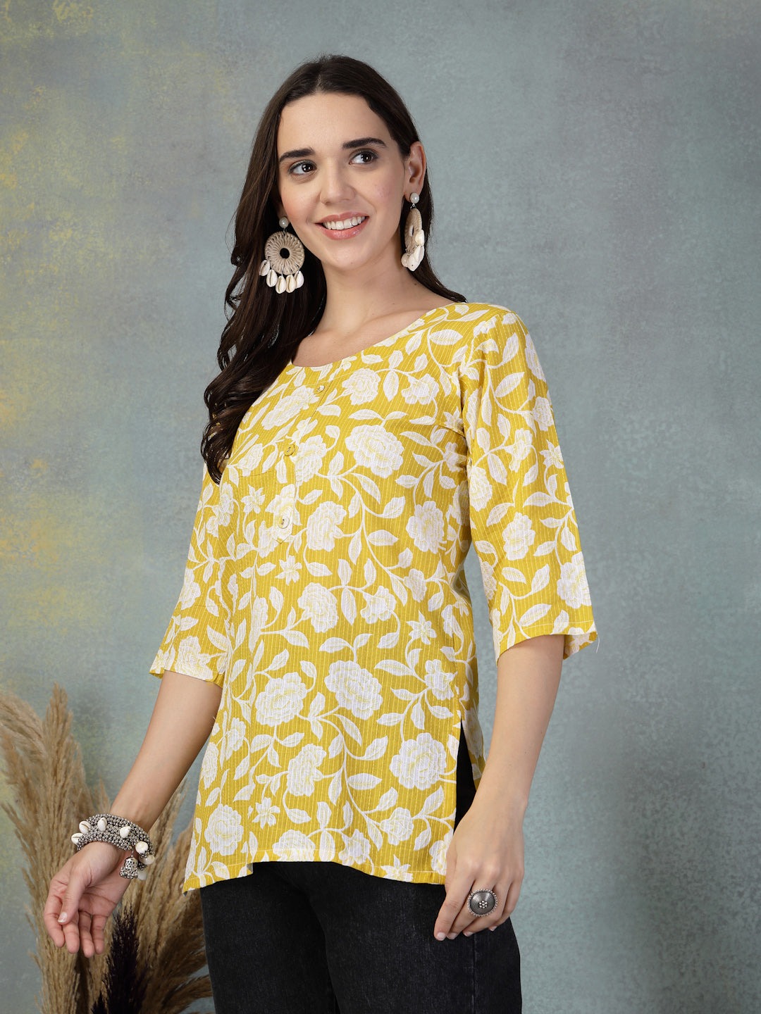 Mustard Kantha Work Printed Cotton Kurti with floral design and intricate embroidery.