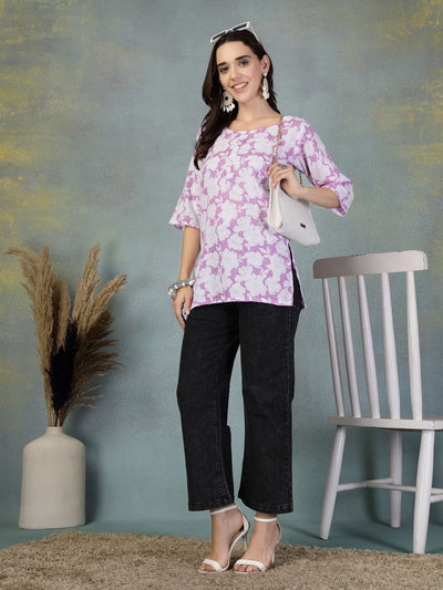 Lavender Kantha Work Printed Cotton Kurti with floral design, worn with black pants and white accessories.