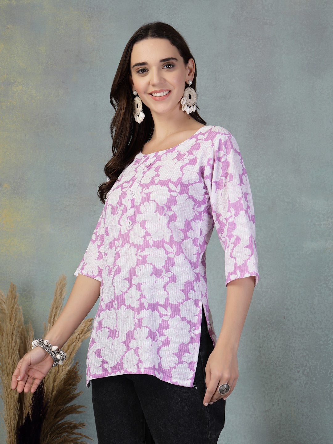 Lavender Kantha work printed cotton kurti with floral design and intricate embroidery.