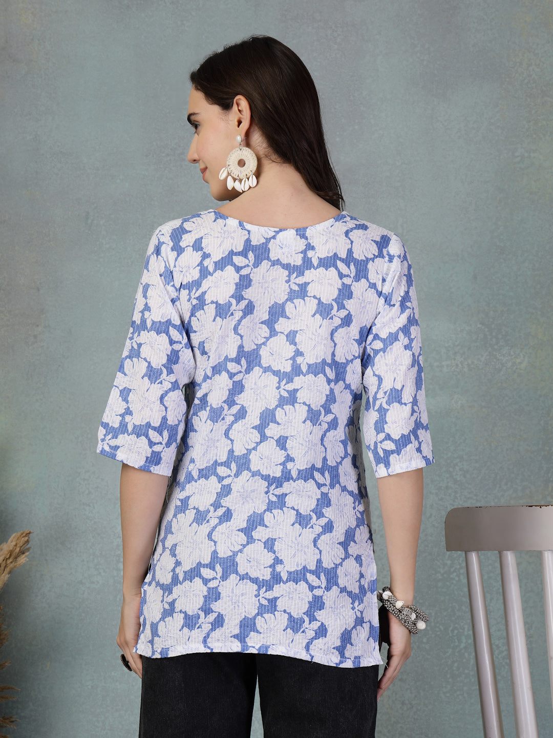 Blue Kantha Work printed cotton kurti with floral design and three-quarter sleeves, styled from the back