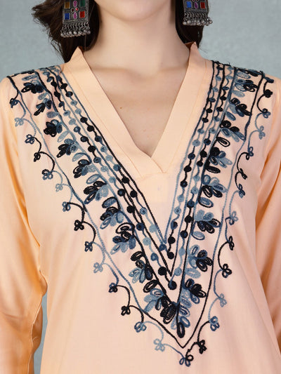Peach embroidered rayon asymmetric co-ord set with Lucknowi-style detailing.
