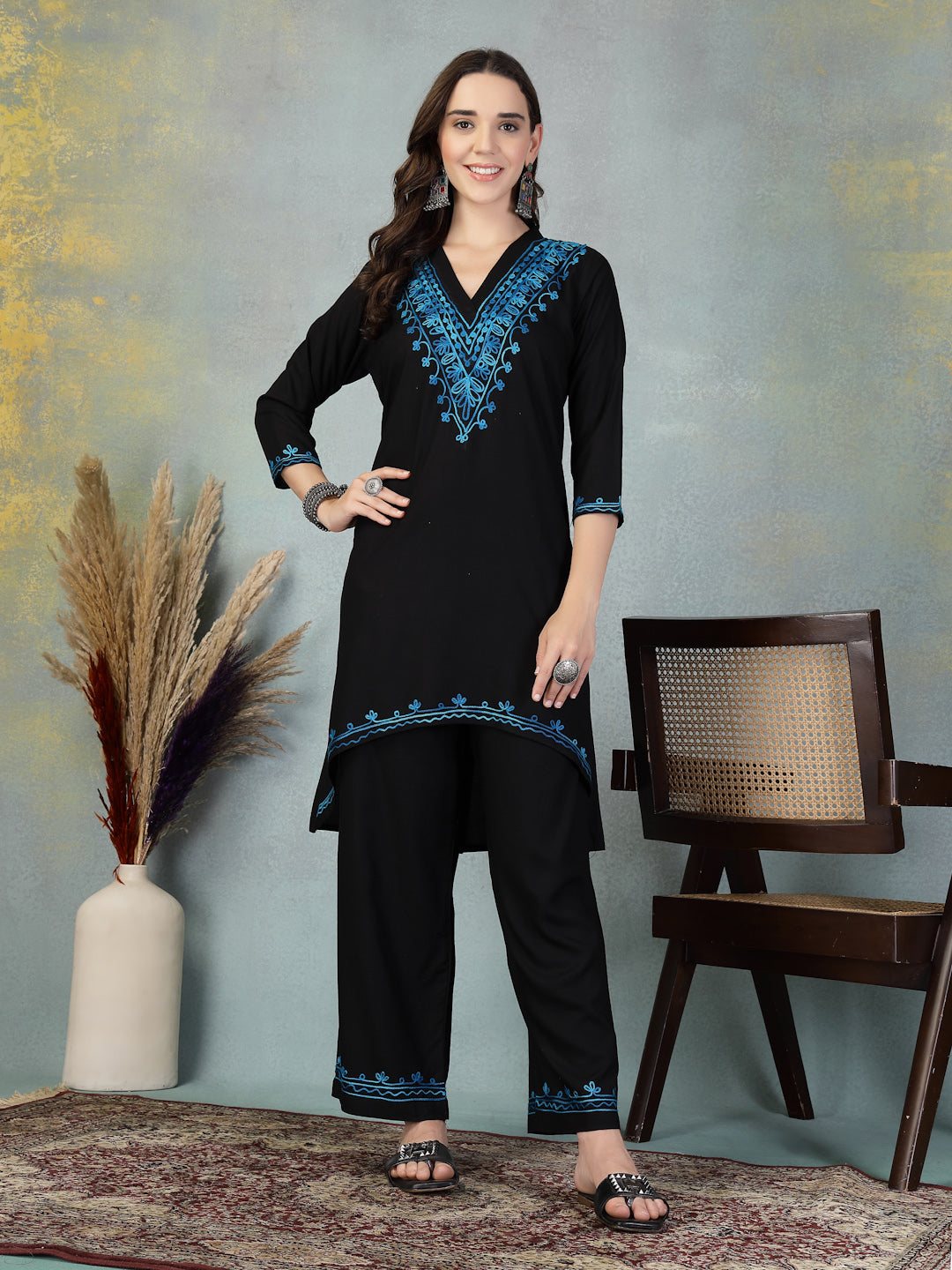 Black embroidered rayon asymmetric co-ord set with Lucknowi-style embroidery.
