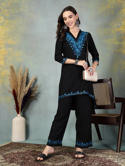 Black embroidered rayon asymmetric co-ord set with Lucknowi-style design.