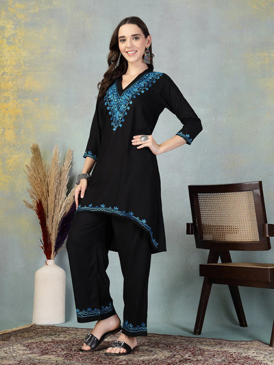 Black embroidered rayon asymmetric co-ord set with Lucknowi-style detailing.