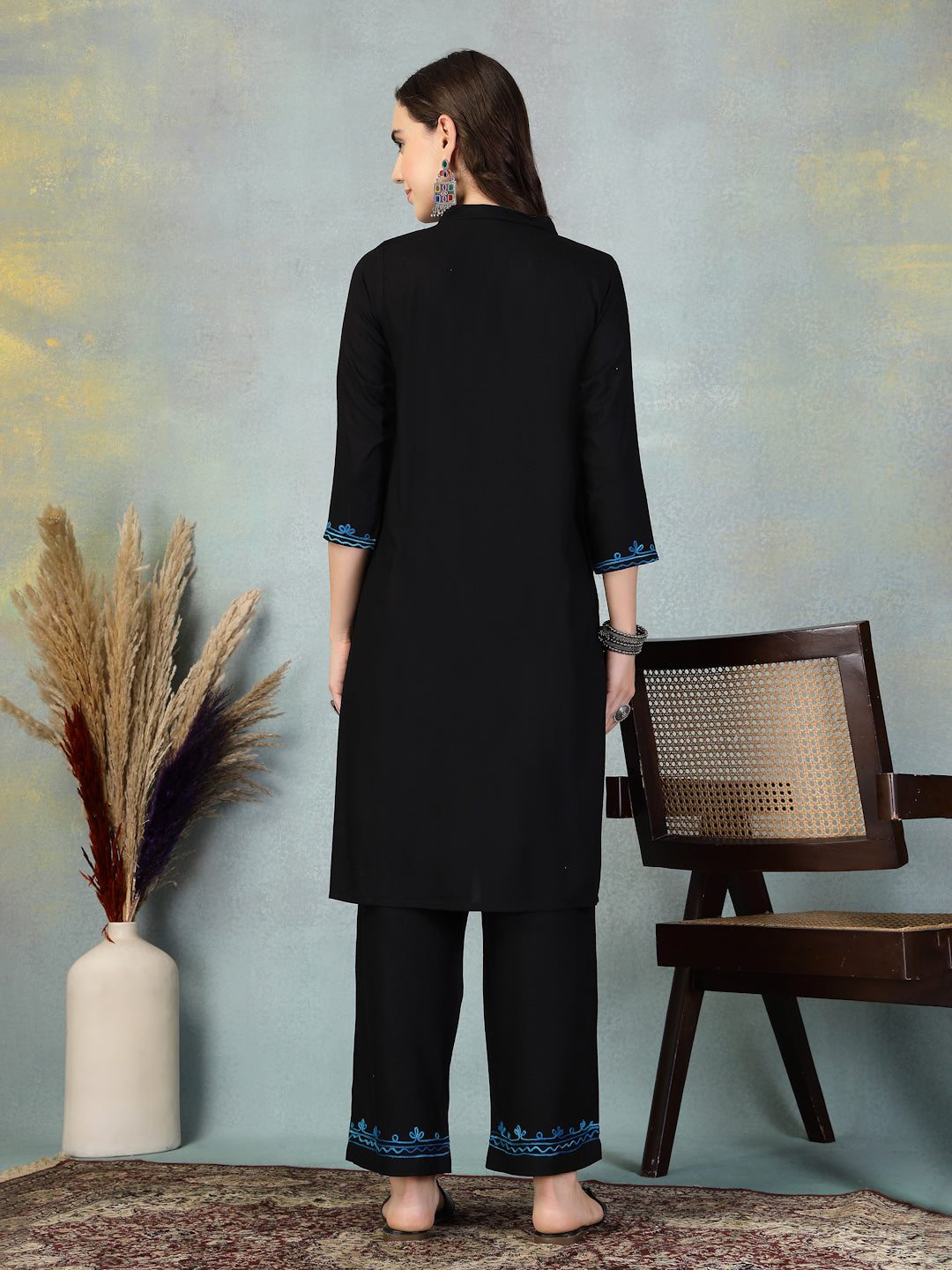 Black embroidered rayon asymmetric co-ord set with Lucknowi-style embroidery.
