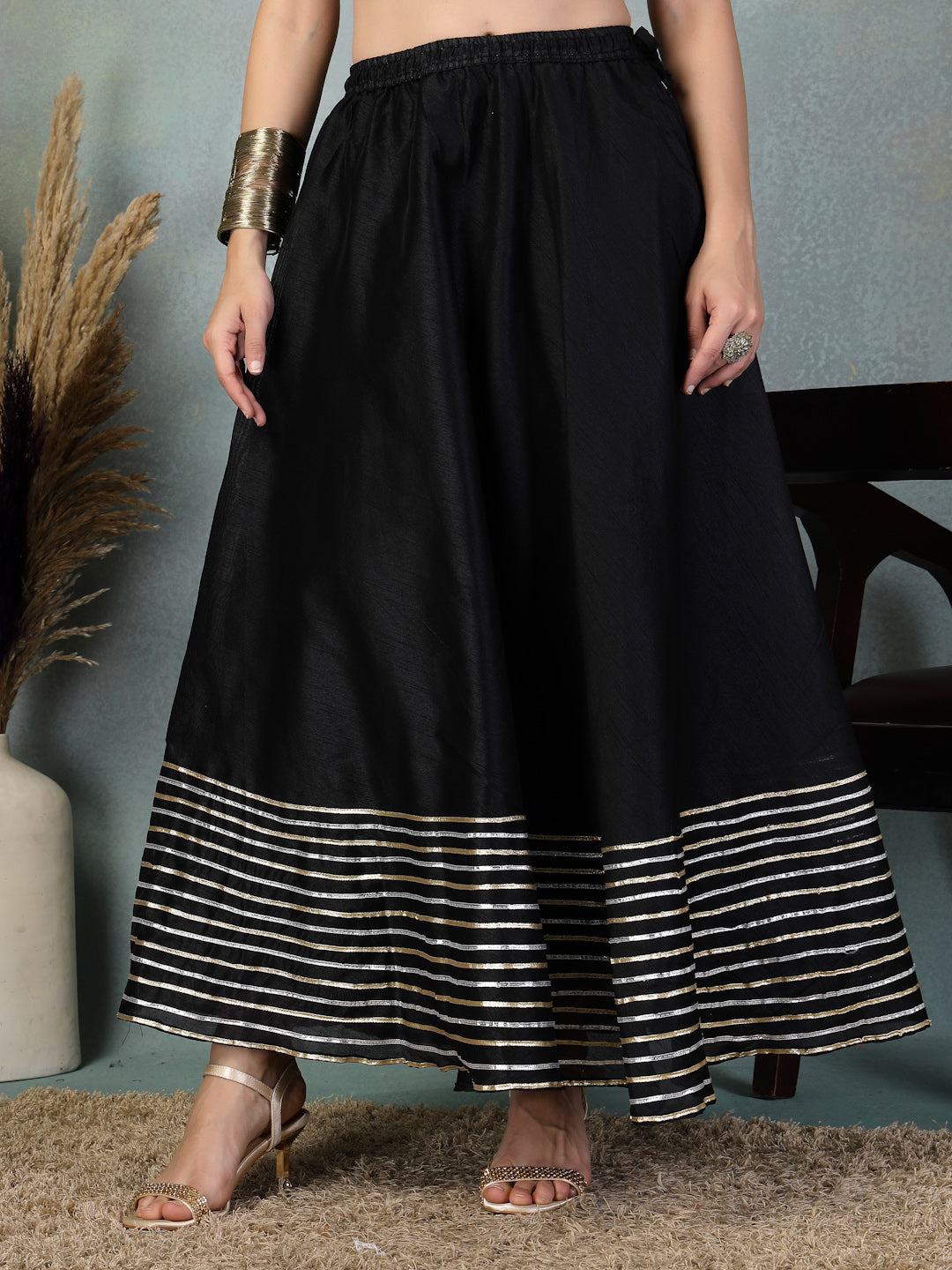 Black Gotta Patti Chanderi silk flared skirt with intricate gold border detailing