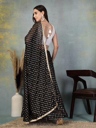 Black printed georgette flared skirt with dupatta showcasing foil print elegance for festive occasions.