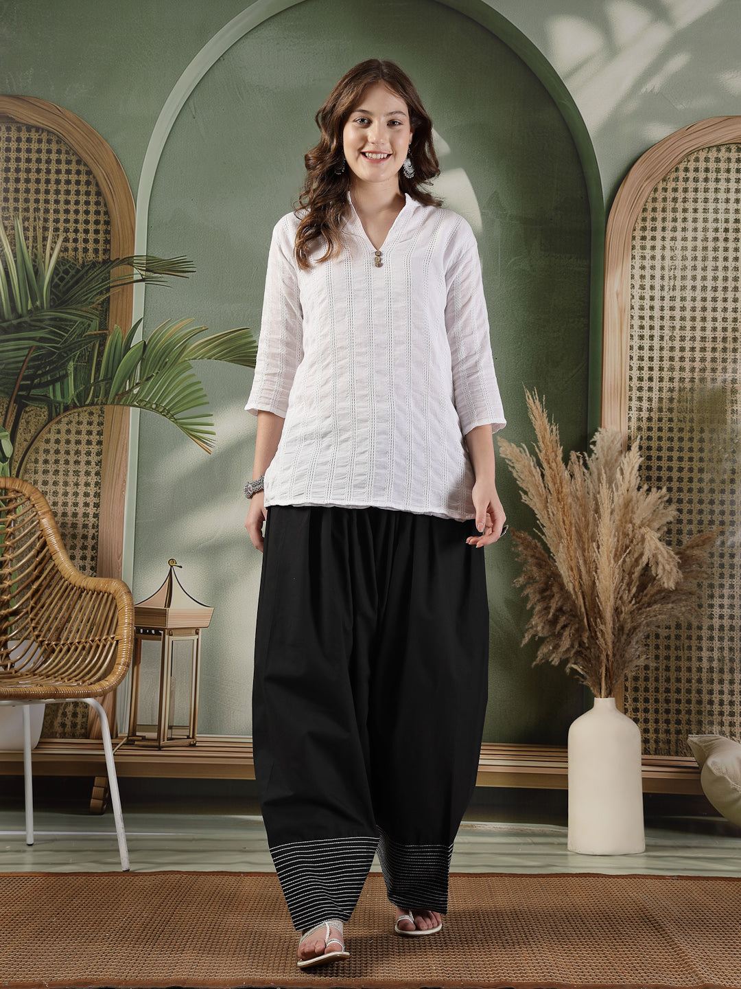 Black solid Farshi Salwar with intricate thread work for ethnic occasions.